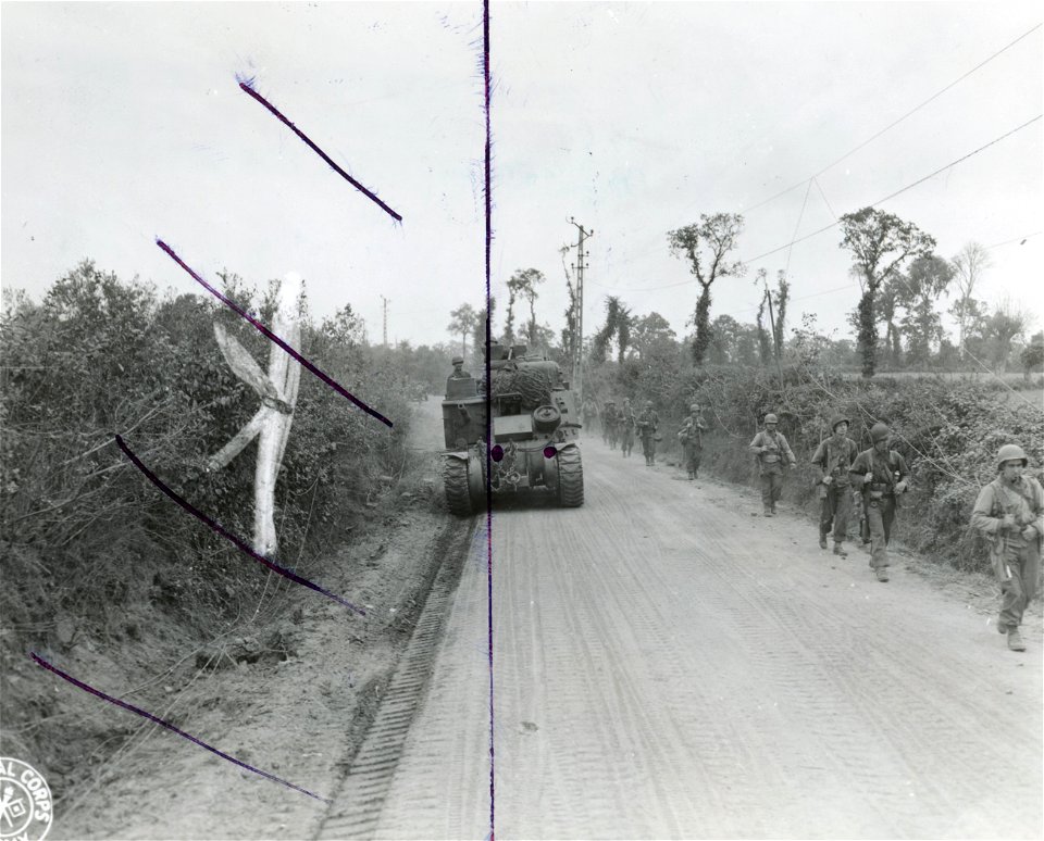SC 270662 - Infantry troops and armor pass along a french road in a never-ending stream as U.S. forces move ahead in the new offensive against the enemy in France.