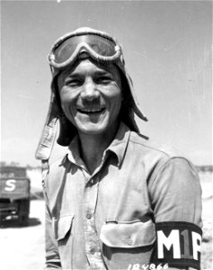 SC 184866 - Motorcycle M.P. Pvt. John H. Christopher, Abbeville, S.C., taken in Barrafranca, Sicily. 19 July, 1943.