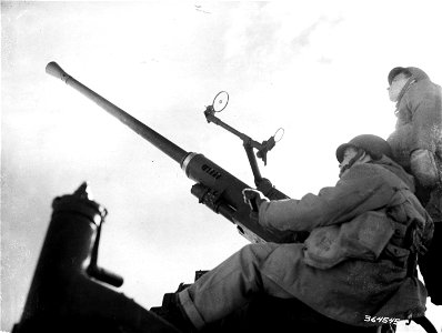 SC 364545 - A 40mm gun crew on alert watching the skies for signs of any enemy planes. This is one of the gun positions guarding Ft. Pepperrell.