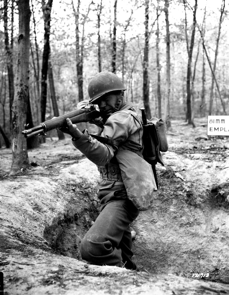 SC 171713 - The doughboy's constant companion is his Garand rifle.