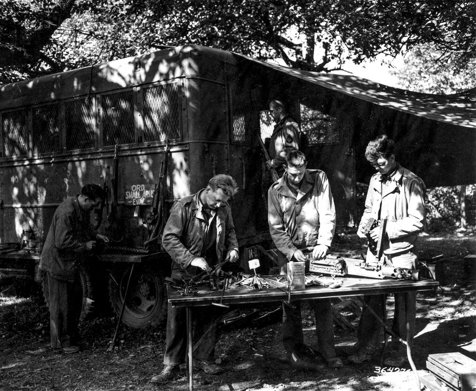 SC 364276 - Always crowded with work is the small arms repair section of the 559th Ordnance Heavy Maintenance Company, supporting combat units of the First U.S. Army in its drive on the Siegfried Line.