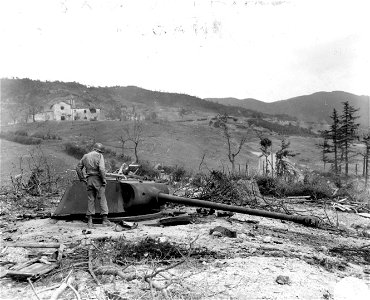 SC 329827 - 75mm German gun knocked out by our artillery with a direct hit in the area south of Futa Pass. 23 September, 1944.