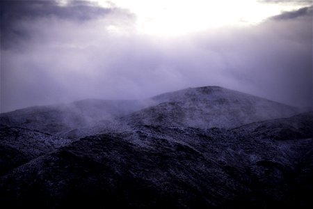 Mist and snow over Belle Mountain photo