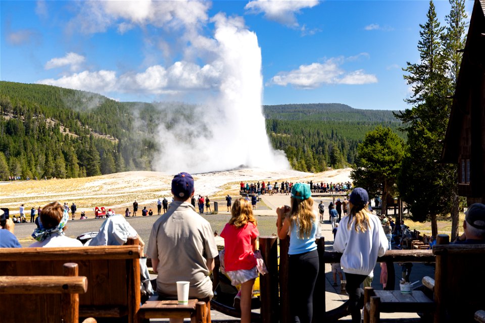Afternoon Old Faithful Eruption from the Observation Deck at the Old Faithful Inn