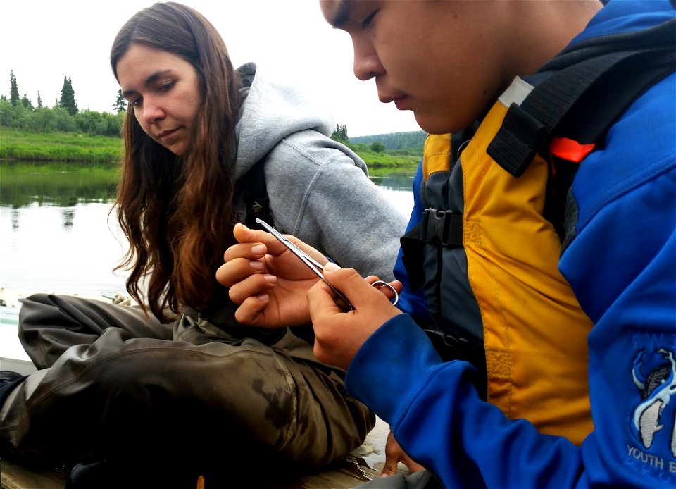 Isaiah and Jenny look at scales