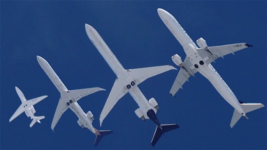Small to tall: Four jets departing from Munich photo