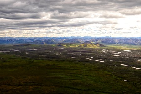Aerial view of coastal plain and Brooks Range.