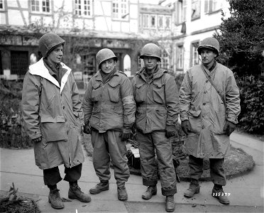 SC 335397 - L-R: T/Sgt. Warren E. Haynes, Taconite, Minn.; T/5 Edmond J. Dwyer, Elizabeth, N.J., Pfc. Edgar W. Ingleton, Flint, Mich.; Pvt. Joseph E. Long, Washington, D.C.