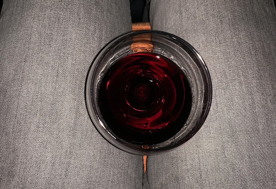 Woman glass red wine