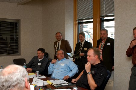Jim Hodgson, CB Bylander and Edd Boggus talk with participants after the listening session