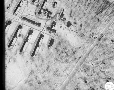 SC 364480 - Camp James Lake taken from Piper Cub of Hq. Bat 12 F.A. Camp James Lake was the rear echelon of the "Blue Forces" during the 2nd Inf. Div. Winter Maneuvers, Camp James Hake, Mich.