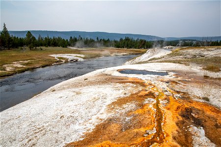 Firehole River as it passes by features in the Upper Geyser Basin photo