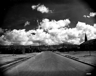 SC 151511 - A few barrage balloons are seen floating from a fort above the Harbor. Hawaii. Balloons are seen floating from Fort Kam above the Harbor. photo