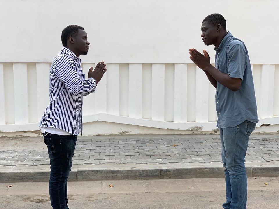 Men people greeting