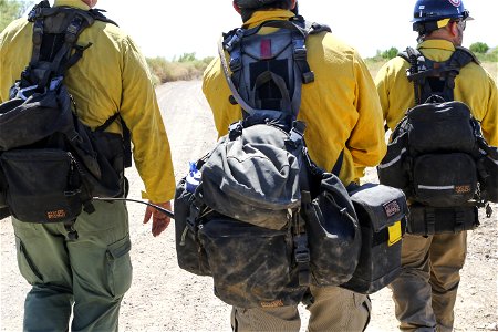 MAY 14: Fire packs and radios on firefighters photo