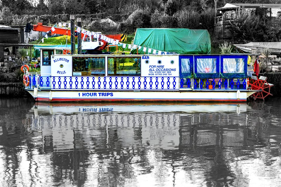 The Allington Belle. It has not moved for a few years. It once did boat trips from Allington to Maidstone.