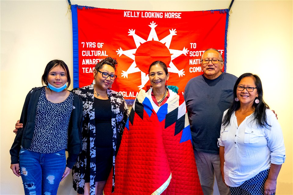 Yellowstone flood event 2022: Secretary Haaland is gifted a blanket from Artist-in-Residence at the Yellowstone Tribal heritage Center