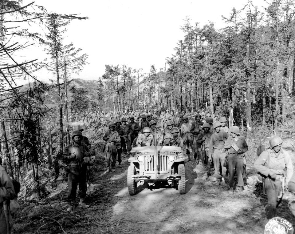 SC 195655 - Troops of 338th Inf., 85th Div., marching toward newly-won position in Gothic Line. 19 September, 1944.