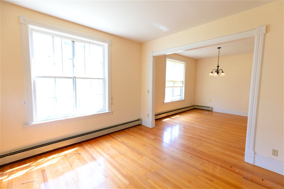 Housing improvement project goal 3 - Soap Suds Row housing: before living / dining room
