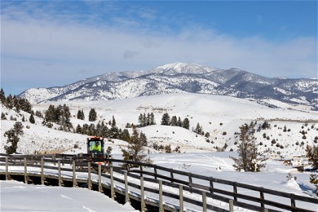 Snow removal equipment clears snow from the boardwalk in Mammoth Hot Springs (1)