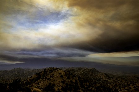 Smoke from the Apple Fire over desert hills and San Gorgonio photo
