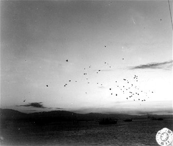 SC 364355 - Navy ack-ack fills the sky as it attempts to bring down Jap suicide bombers at Lingayen Gulf, Luzon, P.I.