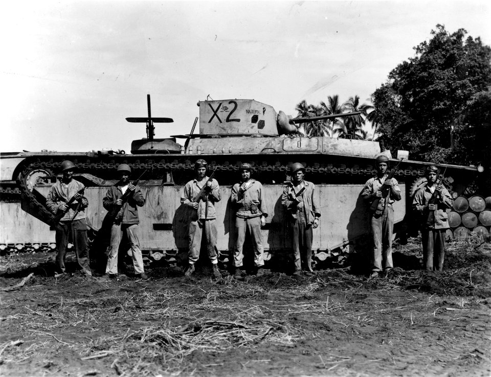 Crew on amphibious tractors equipped and armed. Guadalcanal. 3 March, 1944.