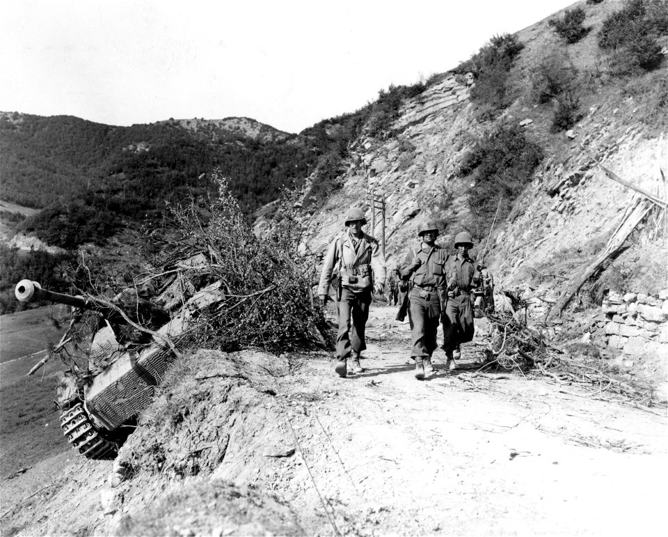 SC 195653 - Mark IV [sic] tank knocked out on a road in the Gothic Line. 19 September, 1944.