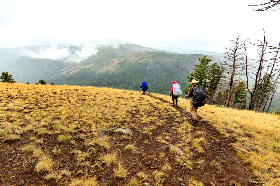 Backpackers dropping off the ridge to Upper Miller Creek