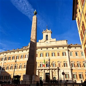 Obelisk of Montecitorio at the parliment house Rome Italy photo