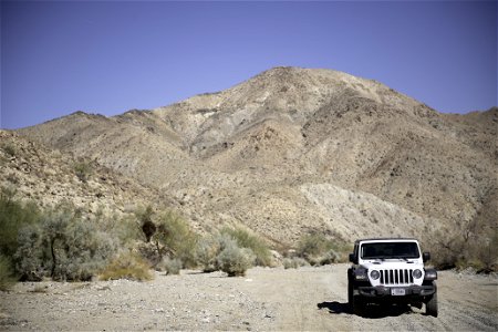 Jeep on sandy section of Pinkham Canyon Road photo