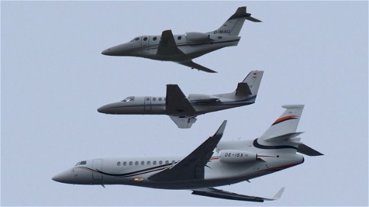 Three business jets in different sizes at 4100 ft.: