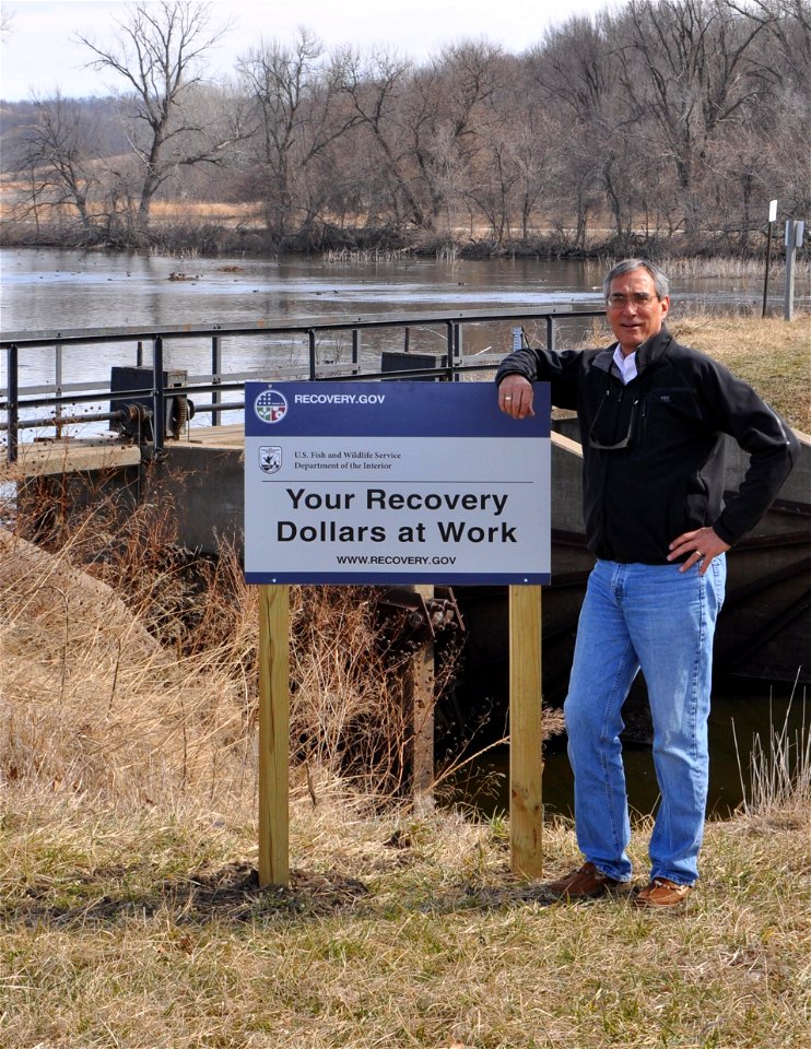 Midwest Regional Director Tom Melius with an ARRA sign