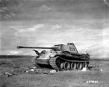 SC 329852 - A German Mark V Panther tank has been knocked out by the U.S. Army Air Corps. It stands alone in this field near Ploy, France. 14 October, 1944.