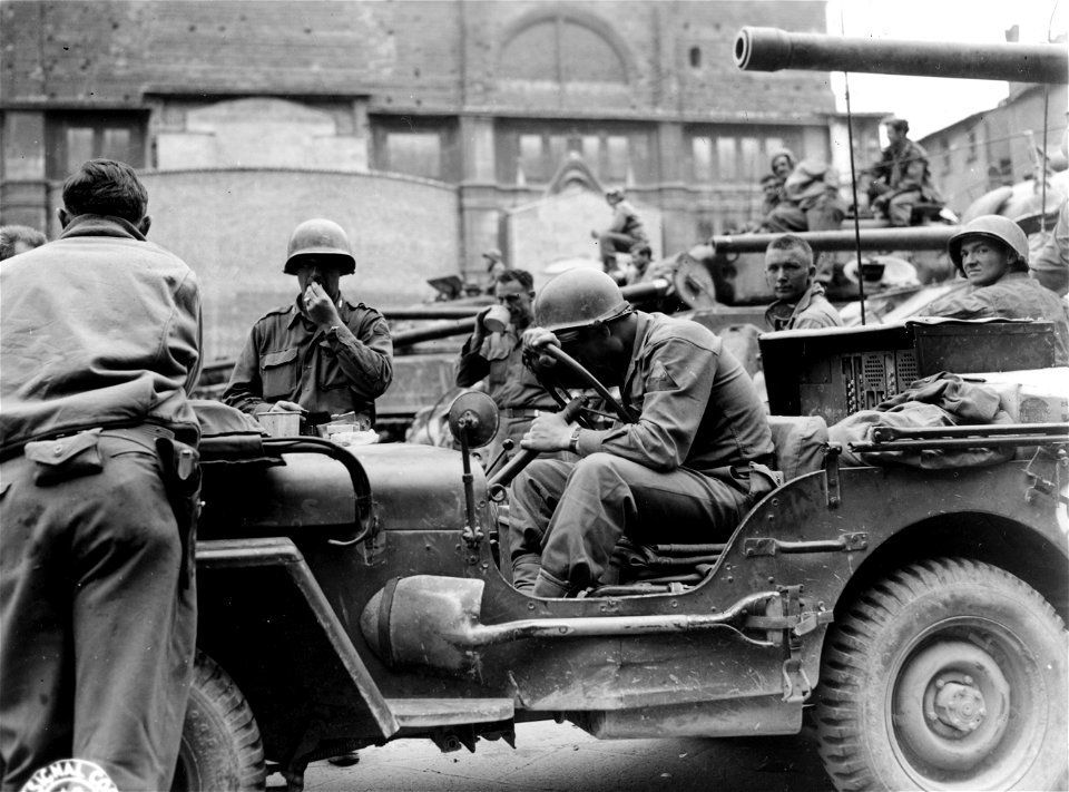 SC 329882 - T/5 Clifford Thompson, 3 Terrace Ave., New London, Conn., of the 752nd Tank Bn., taking a few minutes out to sleep after having made the long, hard push to Bologna. 21 April, 1945.