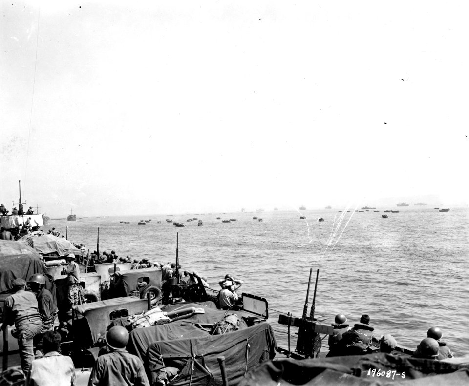 SC 196087-S - LCTs move onto a beach on Leyte Island, P.I.,  under mortar fire from shore positions. 20 October, 1944.