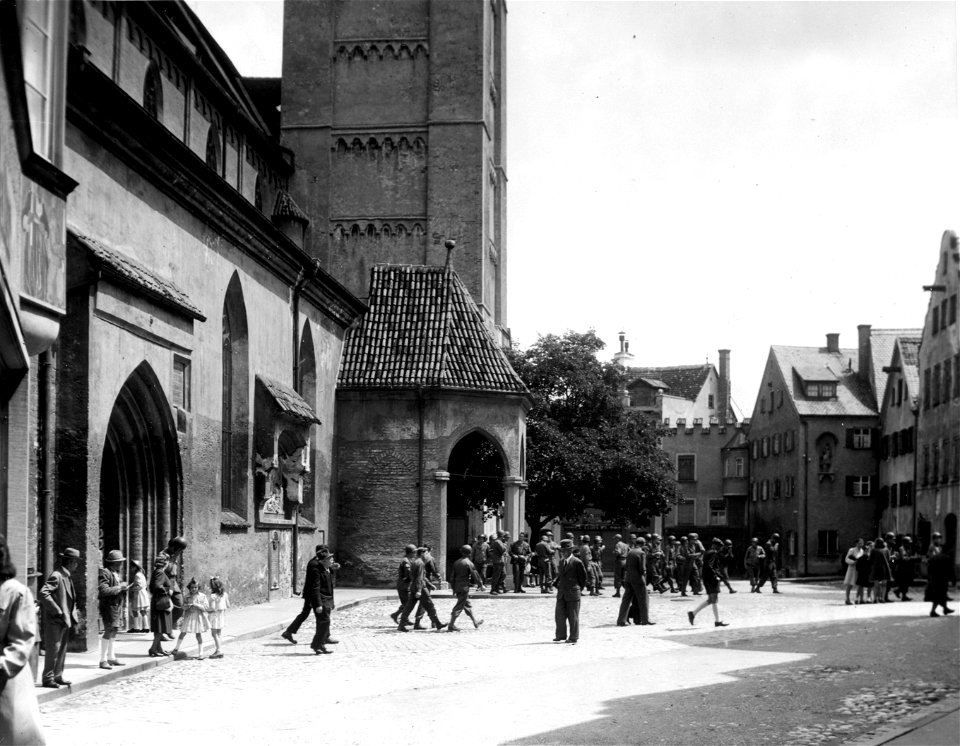 SC 335348 - Catholic soldiers of the 80th Infantry Division leave 500 year-old German church where they attended mass in Kaufbeuren, Germany. photo