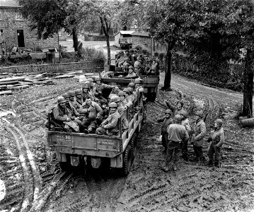SC 195680 - GIs leaving an Army rest camp in Belgium after a 48-hour rest period.