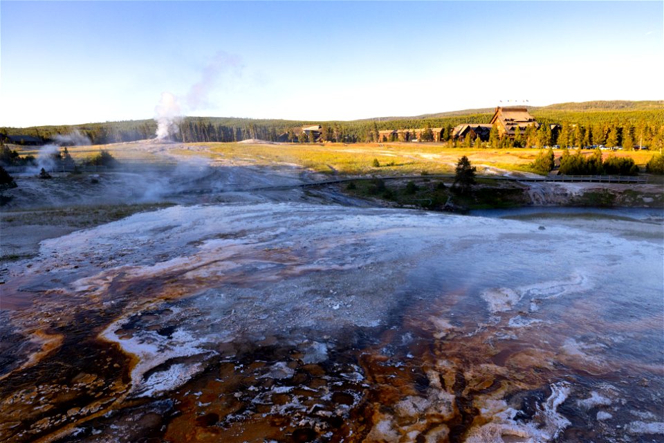 First light on Old Faithful and Old Faithful Inn