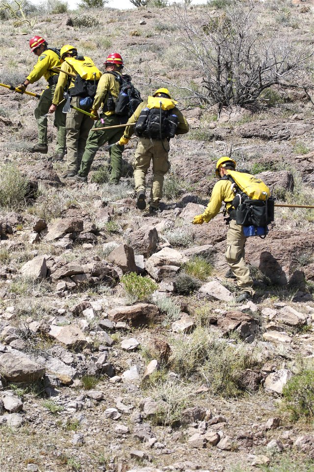 MAY 15 Firefighters practice attack on mock fire