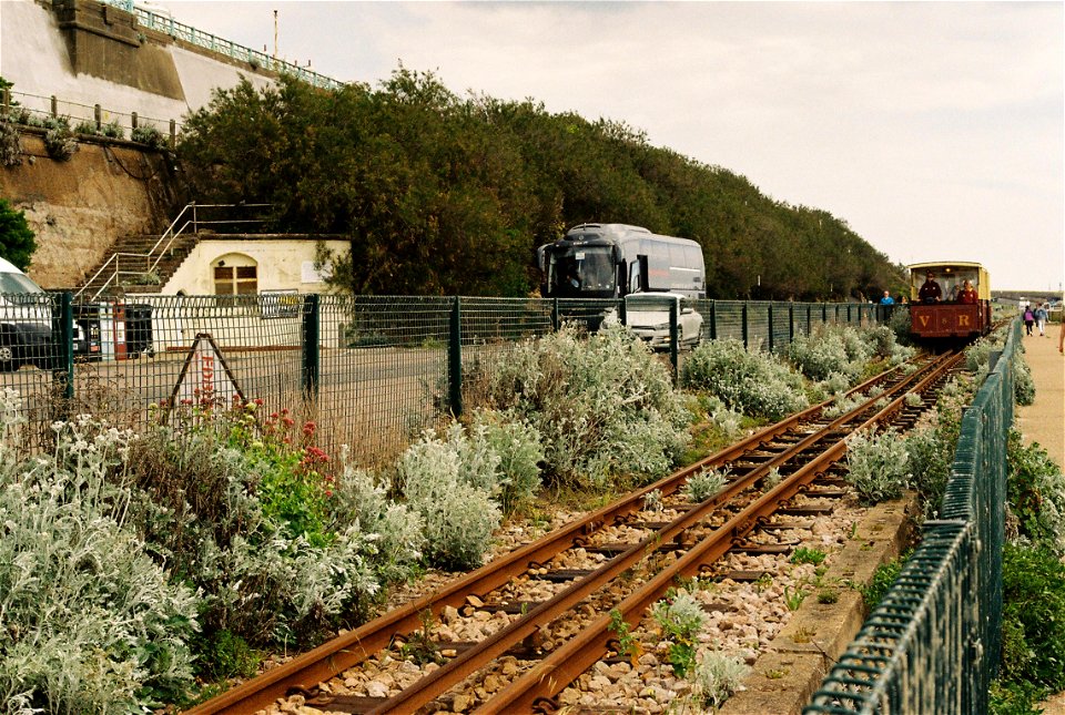 Volks Electric Railway train about to pass the old cliff lift