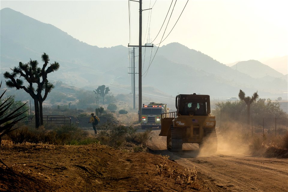 Dozer and Firefighter on the Elk Fire