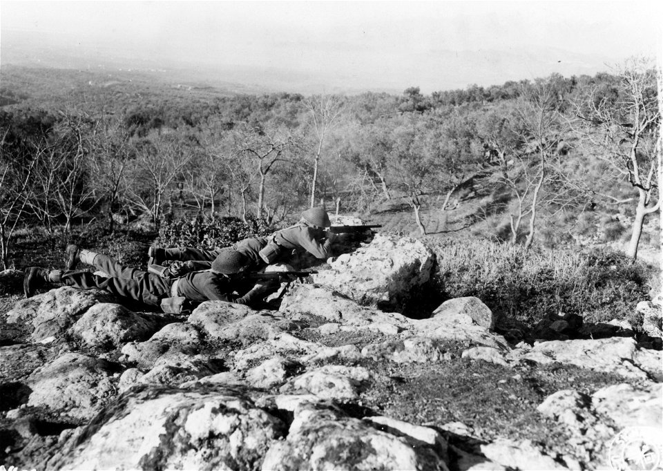 SC 374807 - A patrol from the Wiltshire Regt., British X Corps, tries to draw fire from a German MG nest. 13 January, 1944.
