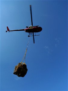 Helicopter sling load of gear photo