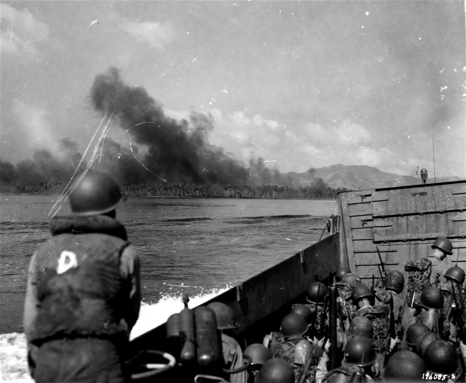 SC 196085-S - View of Leyte Island, P.I., shore line at invasion point. The smoke is from the naval bombardment. 20 October, 1944.