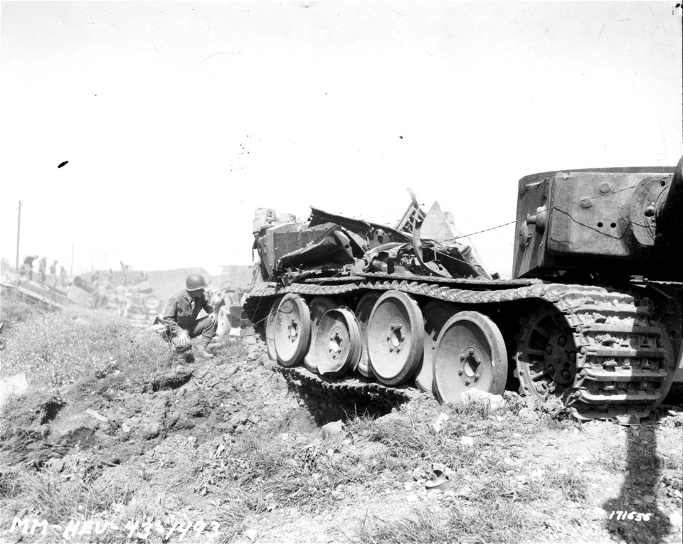 SC 171656 - 16 bogie wheels on a German Mark VI tank. Beja, Tunisia. 23 April, 1943.
