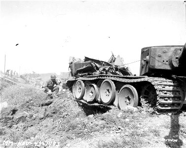 SC 171656 - 16 bogie wheels on a German Mark VI tank. Beja, Tunisia. 23 April, 1943.