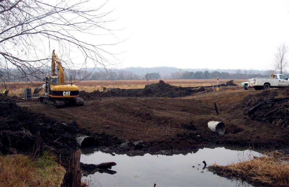 Placing the 36-inch Pipe in Restoration Area