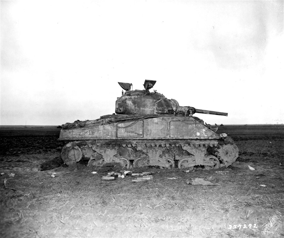 SC 337272 - The "Baby Kenneth VI", a Ninth U.S. Army General Sherman tank, which was hit four times by a German 88-mm shells in action at Hottorf, near Erkelenz, Germany.