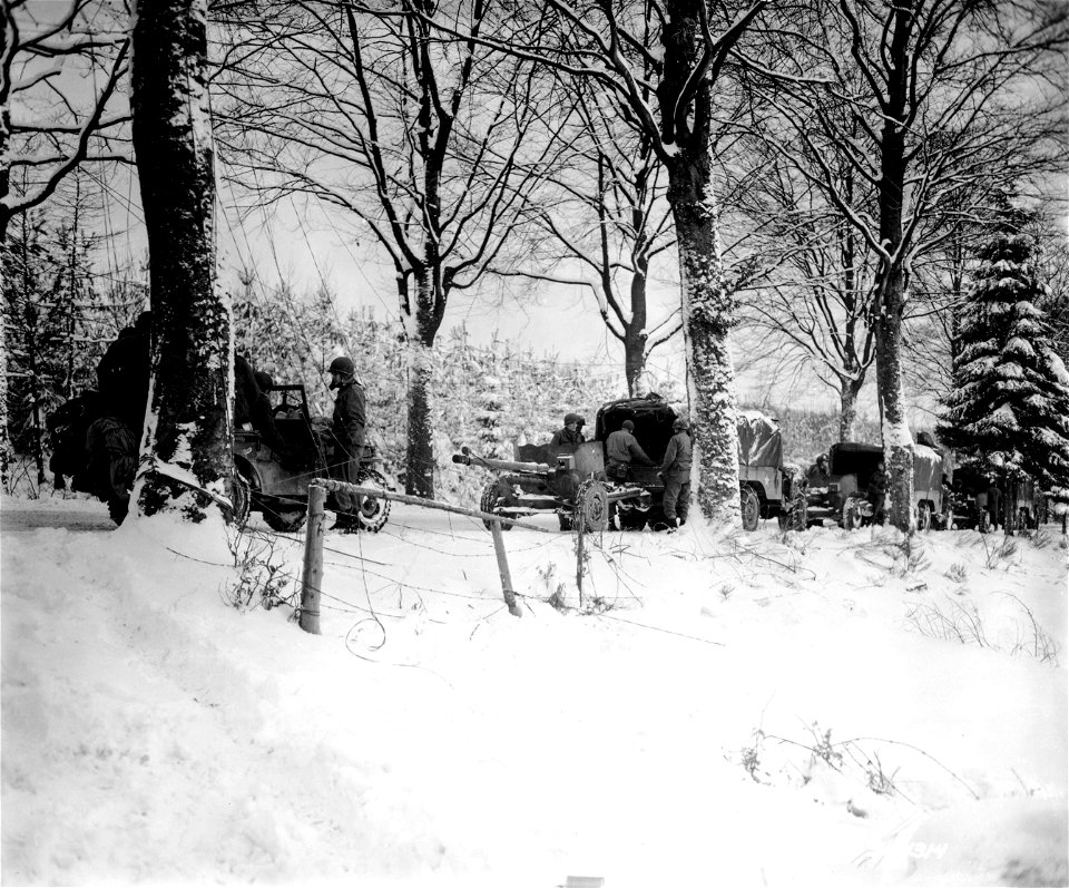 SC 364314 - The Anti-tank Platoon, Headquarters Company, 291st Infantry Regiment, 75th Infantry Division, lines up on a road near Basse Bodeaux...